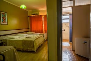 Postel nebo postele na pokoji v ubytování Seibt Palace Hotel