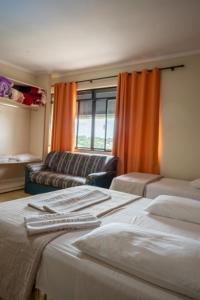 Postel nebo postele na pokoji v ubytování Seibt Palace Hotel
