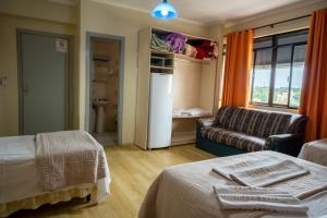 Postel nebo postele na pokoji v ubytování Seibt Palace Hotel