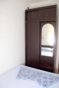 Postel nebo postele na pokoji v ubytování Apartments Tomisa
