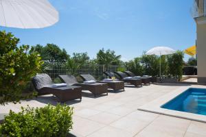 Bazén v ubytovaní Apartment Paradiso - Ravni alebo v jeho blízkosti