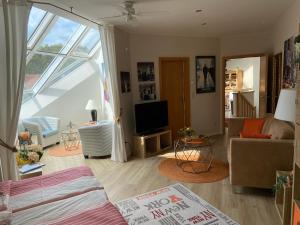 TV a/nebo společenská místnost v ubytování Villa "Auszeit" + 22 fotografií