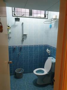 a bathroom with a toilet and a shower at Cool Living at GVR Landed Unit in Genting Highlands +27 photos