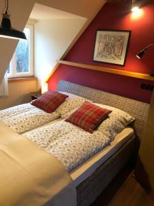 Säng eller sängar i ett rum på Elbfischerhaus am Zollensteig