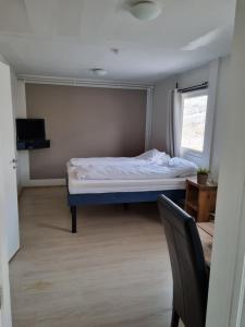 Katil atau katil-katil dalam bilik di Gil guesthouse