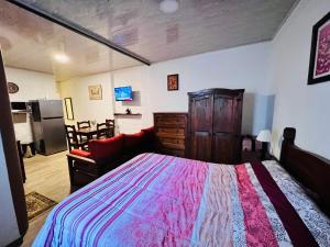 A bed or beds in a room at Monoambiente en Durazno