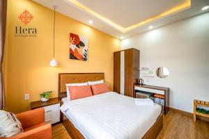 Giường trong phòng chung tại Apé Hotel & Rooftop Bar