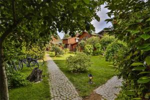 Zahrada ubytování Tranquilla River Lodge