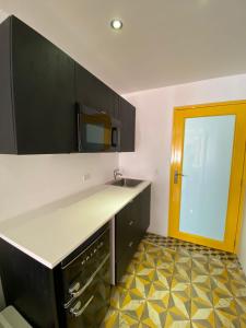 Kuchyň nebo kuchyňský kout v ubytování Hotel Nest