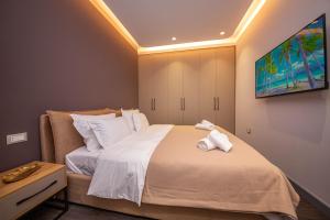 Llit o llits en una habitació de Blloku Unique Apartments