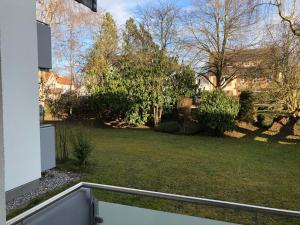 a view of a yard from the balcony of a house at Four Seasons Bodensee in Eriskirch