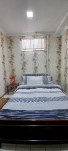 Postel nebo postele na pokoji v ubytování Dream House & Hostel