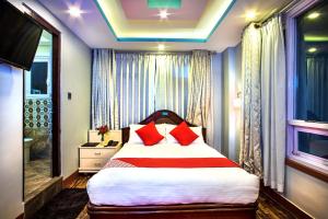 Voodi või voodid majutusasutuse Hotel BnB Mhepi toas