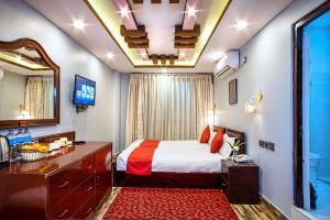 Voodi või voodid majutusasutuse Hotel BnB Mhepi toas