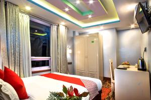 Voodi või voodid majutusasutuse Hotel BnB Mhepi toas
