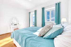 Un pat sau paturi într-o cameră la Apartment Bellaria