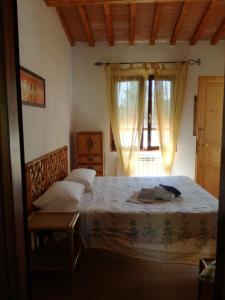 Postel nebo postele na pokoji v ubytování Agriturismo Campolungo + 72 fotografií