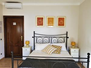 Postel nebo postele na pokoji v ubytování B&B L'orto del Geo