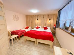 Postel nebo postele na pokoji v ubytování Apartament Jagodzianka Biały Dunajec