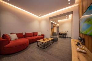 TV a/nebo společenská místnost v ubytování Blloku Unique Apartments