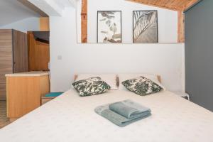 Posteľ alebo postele v izbe v ubytovaní Apartmani Češljar