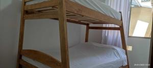 Dviaukštė lova arba lovos apgyvendinimo įstaigoje Acogedora y Hermosa Casa Familiar con WiFi