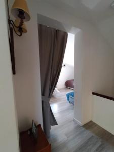 A bed or beds in a room at Puerta Laguna - Casa con parcela