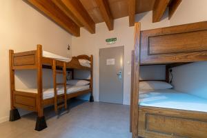 Ένα ή περισσότερα κρεβάτια σε δωμάτιο στο LORENTX ATERPEA