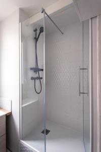 a shower with a glass door in a bathroom at Hypercentre - Gare - La Tour'Angel in Tours +31 photos