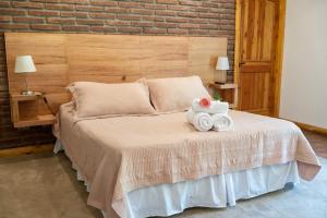 Postel nebo postele na pokoji v ubytování La Casa de Carlitos
