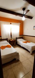 Postel nebo postele na pokoji v ubytování Apartamento Residencial Beija-flor