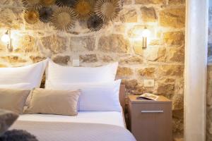 Postel nebo postele na pokoji v ubytování Sea La Vie Apartments
