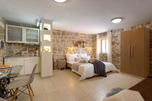 Postel nebo postele na pokoji v ubytování Sea La Vie Apartments