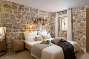Postel nebo postele na pokoji v ubytování Sea La Vie Apartments