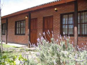 Un jardín fuera de Casabosque Apartamentos