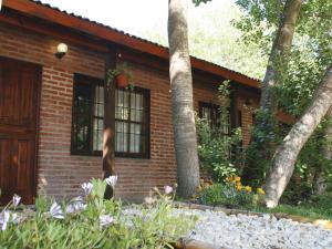 Un jardín fuera de Casabosque Apartamentos