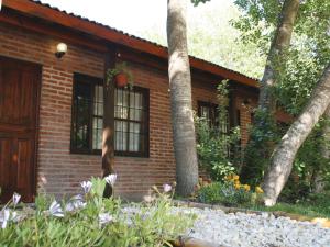 Un jardín fuera de Casabosque Apartamentos