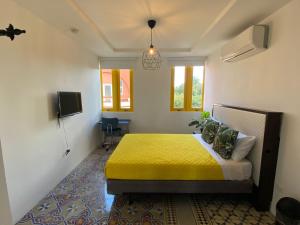 Postel nebo postele na pokoji v ubytování Hotel Nest