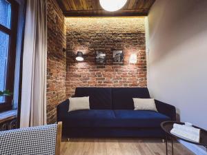 Posedenie v ubytovaní Apartament Harmonia . Odpoczynek na Starówce