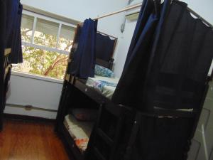 TV a/nebo společenská místnost v ubytování Hostel Maktub