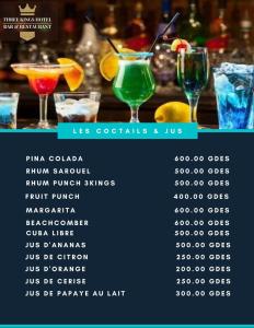 a menu of cocktails in a bar with drinks at Three Kings Hotel in Vertières