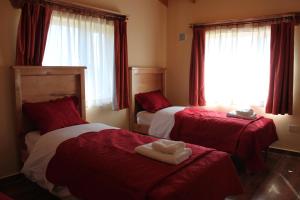 Katil atau katil-katil dalam bilik di Eco Vista Hotel