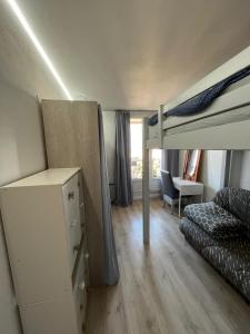 Katil dua tingkat atau katil-katil dua tingkat dalam bilik di Grand appartement proche de Paris