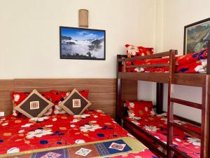 Postel nebo postele na pokoji v ubytování Sapa Garden Hotel