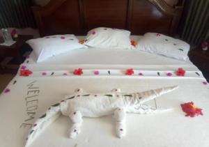 Vuode tai vuoteita majoituspaikassa Watamu Adventist Beach Resort