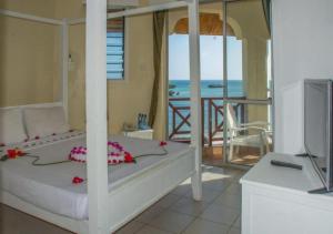 Vuode tai vuoteita majoituspaikassa Watamu Adventist Beach Resort