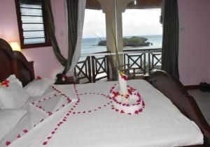 Vuode tai vuoteita majoituspaikassa Watamu Adventist Beach Resort