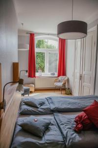 Ein Bett oder Betten in einem Zimmer der Unterkunft Hof Osterholz
