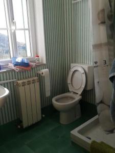 Vonios kambarys apgyvendinimo įstaigoje Ca' Clémentine