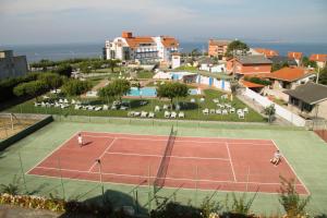 Tenis alebo squash v ubytovaní Hotel Luz de Luna alebo jeho okolí